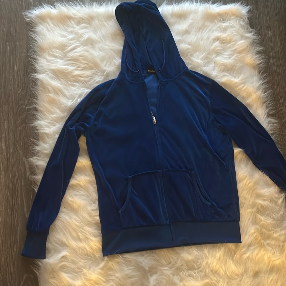 Blueberry colored velvet track suit in size medium.